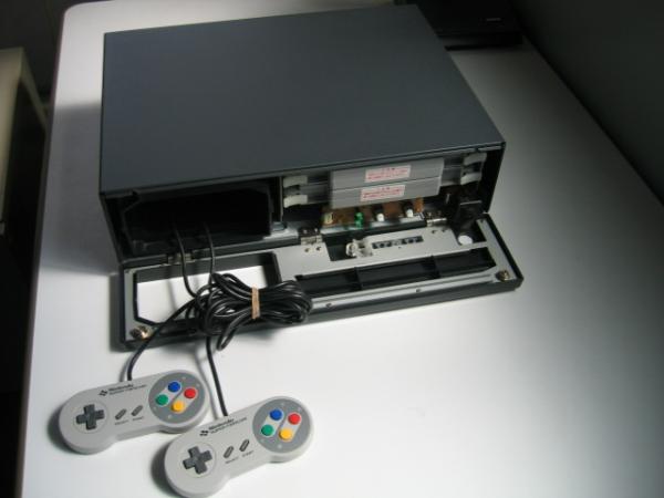 Front of the Super Famicom Box showing how the carts are inserted